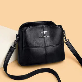 (Compre 1 LEVE 2 UNIDADES) Bolsa Feminina de Couro Nobre Megan® / Elevando seu Estilo a um Patamar Superior